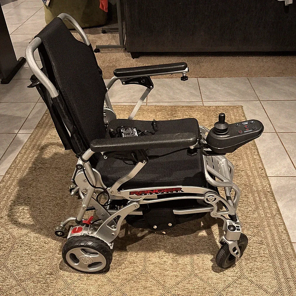RANGER FOLD & TRAVELER ULTRA PORTABLE LIGHTWEIGHT FOLDING ELECTRIC WHEELCHAIR